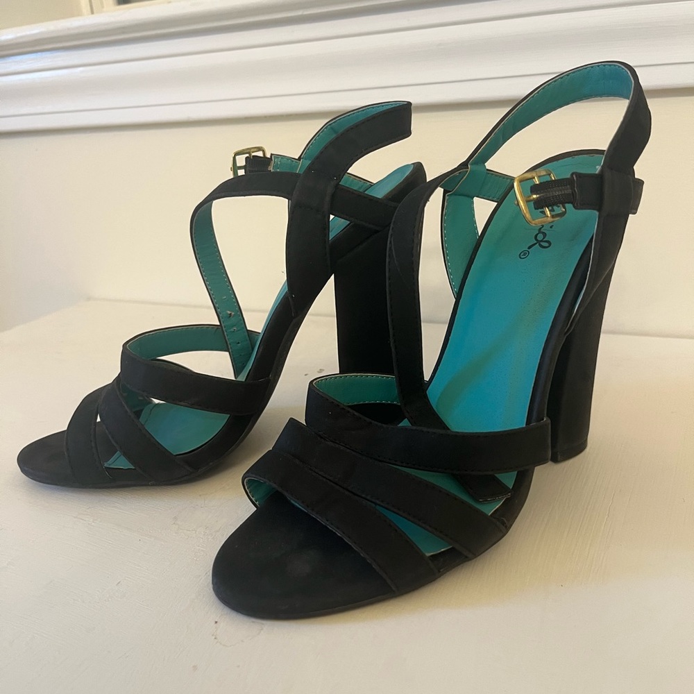 Black and strappy velveteen heels